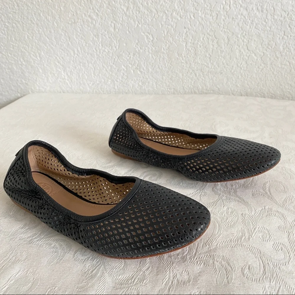 Tory Burch black perforated flats